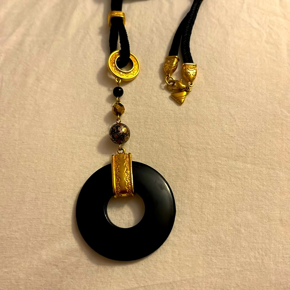 Liz Claiborne cord necklace with gold tone accents